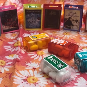 Twelve Adult and Young Adult book candy party favors with Mini Tic Tacs
