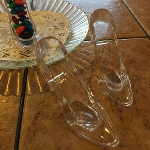 Twelve Cinderella glass slipper acrylic shoes for party favors and more