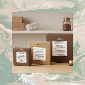 May include: Three brown boxes labeled "Small", "Medium", and "Large" with white labels. The boxes are labeled "Chocolate Chip Cookies" and list ingredients. The small box is 3.8 x 3.8 cm, the medium box is 5.1 x 5.1 cm, and the large box is 7.6 x 7.6 cm.