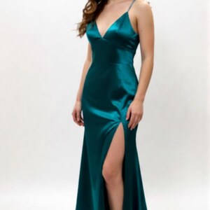 elvira hancock green dress I've always wanted everything that Elvira wears in Scarface, but specifically this dress. I've tried to find this dress everywhere and could never find anything that captured the beauty of this silk,