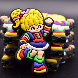 Cuenta de silicona Rainbow Girl • Cuenta con personaje inspirado en el Orgullo • Material colorido para manualidades DIY