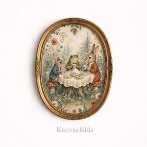 May include: An oval framed print depicts a tea party with a mouse, frog, and rabbit seated around a table. The table is set with a teapot, cups, and cookies. The background features a forest scene with flowers. The frame is gold, and the print is labeled "Kanvas Kids."