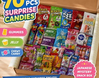 May include: A cardboard box filled with 70 pieces of assorted Japanese candies and snacks in colorful individual plastic packaging. The collection includes various gummies, jelly treats, and chewy candies with Japanese text on the wrappers.