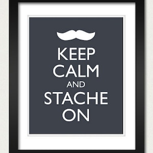 May include: A dark gray poster with white text that reads "Keep Calm and Stache On". A white mustache is above the text.