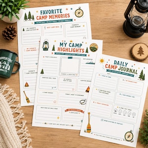 May include: Three printed camp-themed activity sheets featuring sections for memories, highlights, and daily journaling. The white paper pages include colorful illustrations of pine trees, a compass, a lantern, a campfire, and a canoe paddle.