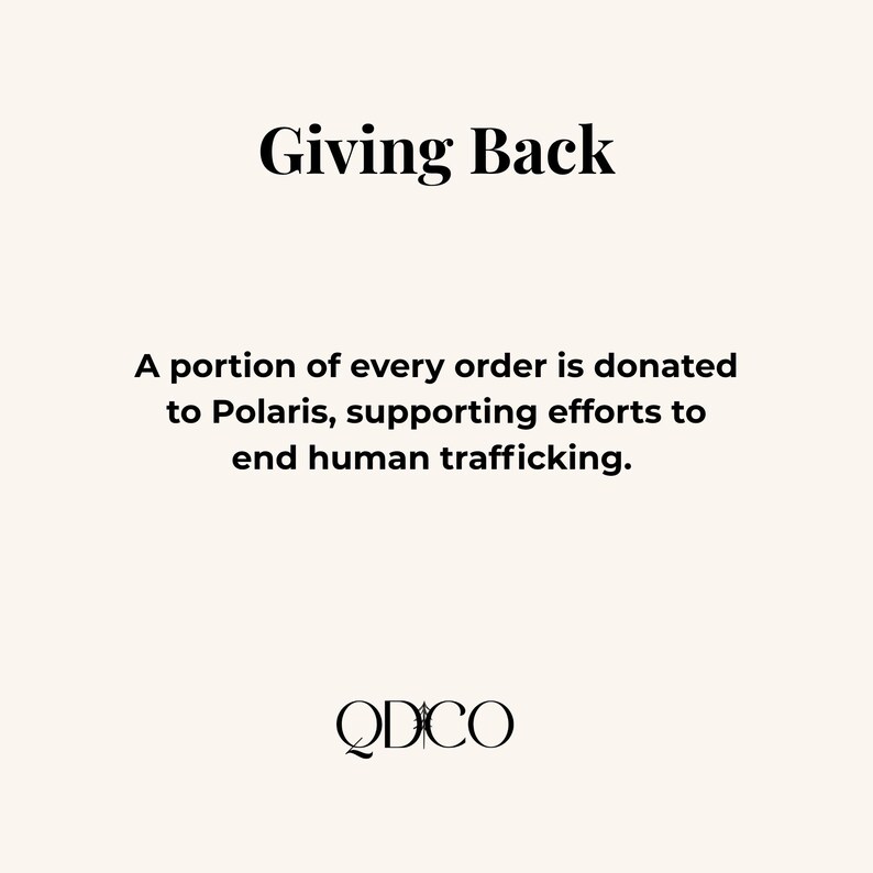 May include: Cream-colored graphic with the text "Giving Back" in a bold, black font. Below, it states that a portion of every order is donated to Polaris to end human trafficking. The logo "QDCO" is at the bottom.