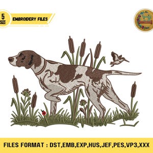 May include: An embroidery file design featuring a hunting dog in a field of reeds, with a bird in flight. The dog is brown and white, with green and brown foliage. The text "EMBROIDERY FILES" is displayed.