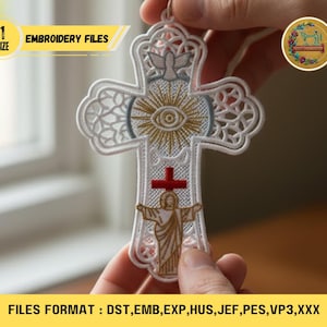 May include: White embroidered cross with detailed design, including a dove, an eye, and a figure of Jesus. The cross has a red cross at the centre and is held by hands. The text "EMBROIDERY FILES" is visible. The cross is an embroidery file.
