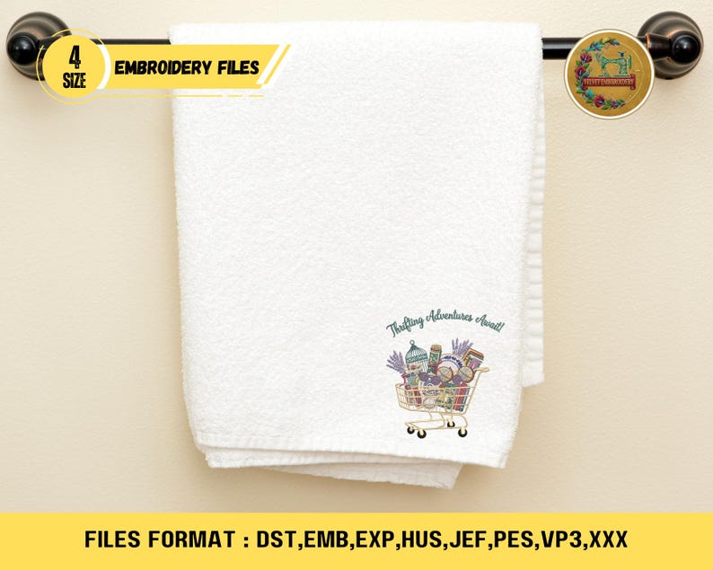 May include: White folded towel with an embroidered shopping cart design filled with various items. The text "Thrifting Adventures Await!" is above the cart. The towel is hanging on a black towel rack. The image also includes text that says "4 SIZE EMBROIDERY FILES".