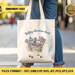 May include: A white tote bag with the text "Thrifting Adventures Await!" and a shopping cart graphic filled with vintage items. The bag also has the text "4 SIZE EMBROIDERY FILES" and "FILES FORMAT : DST, EMB, EXP, HUS, JEF, PES, VP3, XXX".