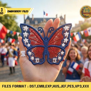 May include: A blue, red, and white butterfly embroidery file, with star and stripe details, is held up in front of a crowd waving French flags. The embroidery is in the shape of a butterfly. The text "EMBROIDERY FILES" is in a yellow box.