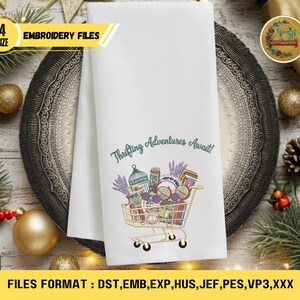 May include: White tea towel with the text "Thrifting Adventures Await!" and a shopping cart graphic filled with vintage items. The towel also has a yellow banner that says "4 SIZE EMBROIDERY FILES".