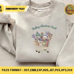 May include: A beige sweatshirt with the embroidered phrase "Thrifting Adventures Await!" above a shopping cart filled with various items. The image includes text that says "4 SIZE EMBROIDERY FILES" and "FILES FORMAT : DST, EMB, EXP, HUS, JEF, PES, VP3,XXX".