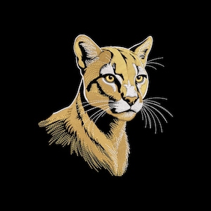 May include: A detailed embroidered cougar head in gold and white thread on a black background. The cougar's eyes are yellow, and the whiskers are long and white. The embroidery style gives the image a textured appearance.