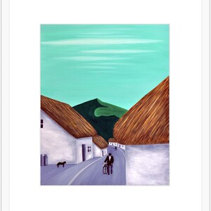 May include: An acrylic painting shows a village scene. White buildings with thatched roofs line a road, with a person on a bicycle. A black dog stands near a bin. The sky is a light turquoise colour, and a green mountain is in the background.