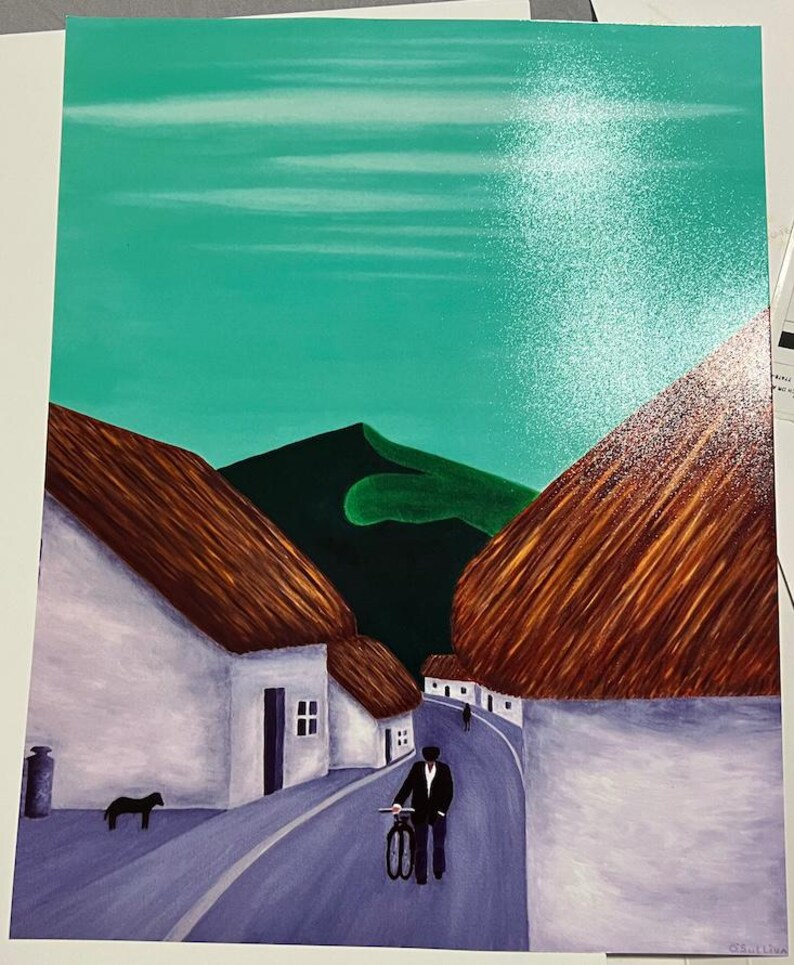 May include: An original painting showing a rural scene with white houses, brown thatched roofs, and a road. A person in a suit walks with a bicycle. A black dog is near a stone container. The sky is teal with a bright spot.