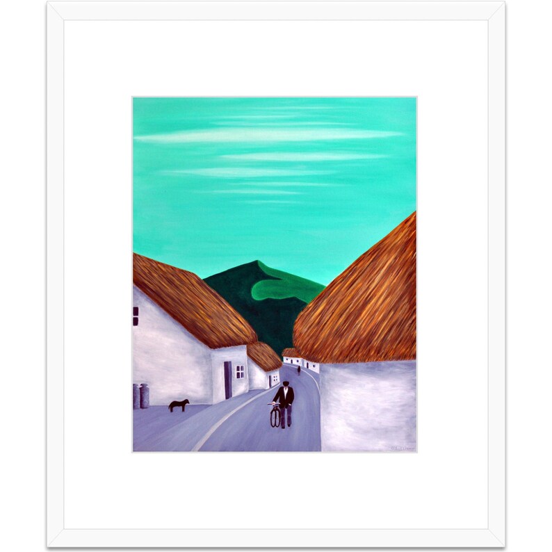 May include: An abstract painting depicting a village scene. White buildings with brown thatched roofs line a road. A person on a bicycle is on the road. A black dog is near the buildings. The sky is turquoise and a green mountain is in the background.