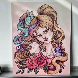 May include: A colorful illustration of a woman with long, flowing blonde hair, adorned with two rabbits. The artwork features a pink background, a large pink rose, and a whimsical, fantasy theme. The woman's hair is styled with pastel colors.