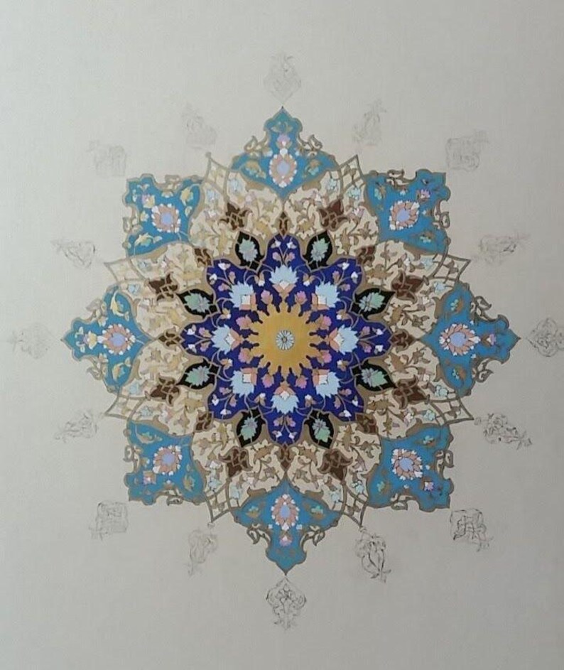 May include: A symmetrical, ornate design featuring a central yellow circle surrounded by intricate blue, teal, and brown floral patterns. The design is set against a neutral background, with subtle, faded floral motifs around the edges.