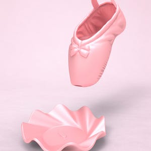 May include: A light pink ballet slipper with a small bow detail on the toe, positioned above a matching light pink circular dish with a ruffled, wavy edge. Both items feature a smooth, matte finish and a uniform, solid pastel color throughout.