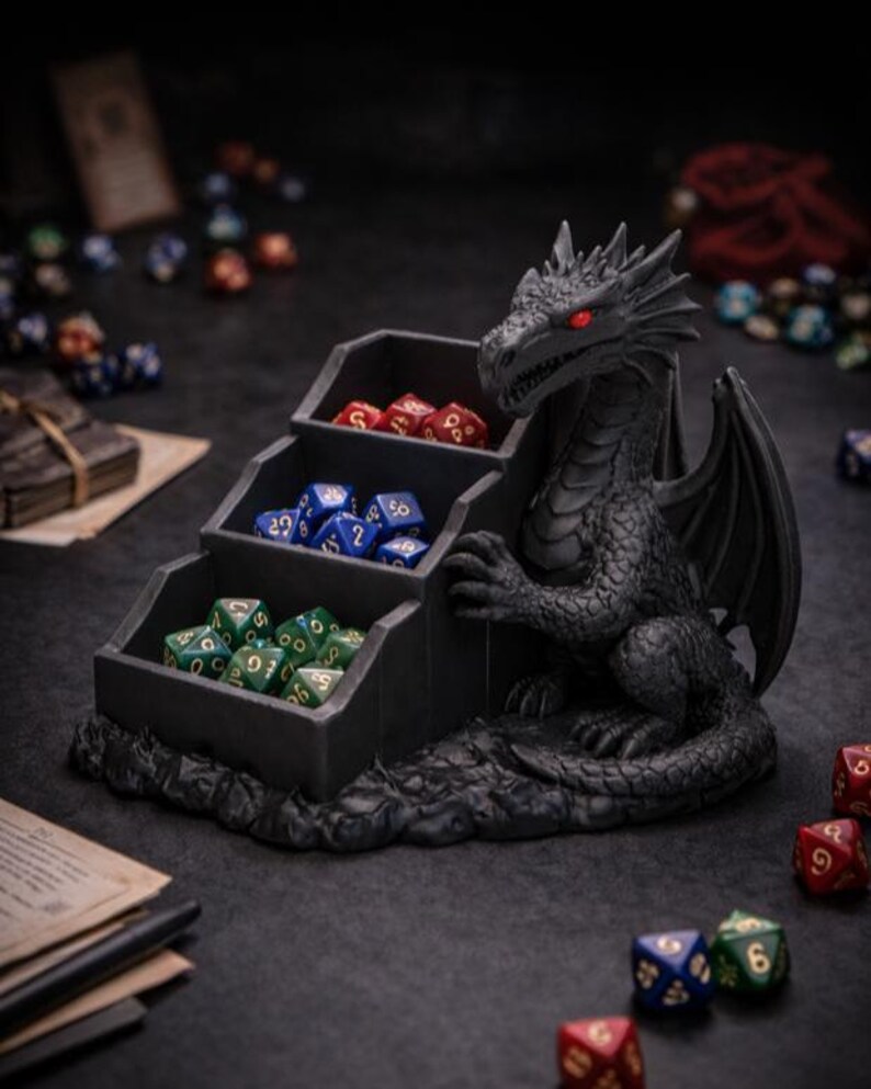 Dragon dice organizer STL shown as a fantasy dragon guarding a three-compartment dice holder, 3D printable tabletop RPG accessory.