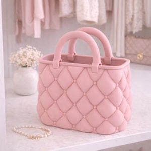 Tufted bag organizer STL file displayed as a quilted handbag-style decorative storage basket.