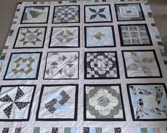 Een individuele handgemaakte 100% katoenen patchworkquilt
