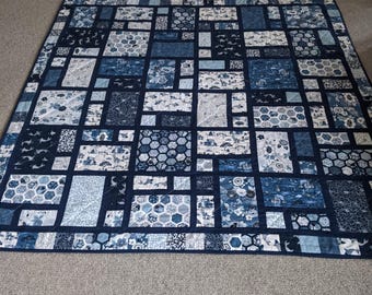 Katoenen patchworkquilt in blauwtinten