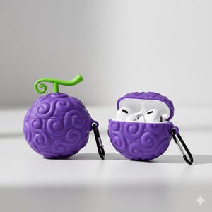Puede incluir: Dos fundas moradas y esféricas para AirPods con un tallo verde, que se asemejan a una fruta. Una funda está cerrada, la otra abierta, revelando AirPods blancos. Ambas fundas tienen un mosquetón negro.