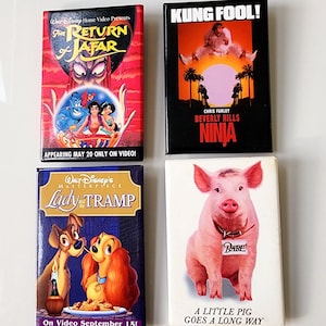 Botones de estreno de películas antiguas, estreno de películas de los años 90, El regreso de Jafar, Beverly Hills Ninja, La dama y el vagabundo, Babe, Farley