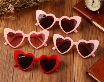 Heart-shaped sunglasses, a must-have for brides and bridesmaids—stylish wedding favors, perfect for retro photos.