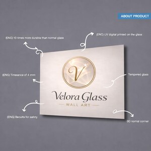 May include: A rectangular tempered glass wall art piece featuring the Velora Glass logo with a central letter V inside a gold circle. The product details include 4 mm thickness, UV digital printing, 10 times more durability, and beveled edges.