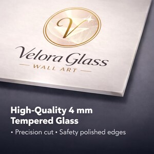 May include: A corner view of a white, rectangular piece of tempered glass with the text "Velora Glass WALL ART" in black and gold. The text "High-Quality 4 mm Tempered Glass" is also visible, along with "Precision cut &bull; Safety polished edges."