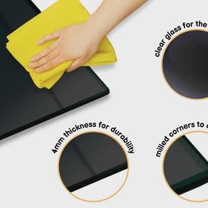 May include: A rectangular clear glass sheet being wiped with a yellow cloth. Circular insets highlight features: clear glass for the best display, 4mm thickness for durability, and milled corners to avoid cutting, with text labels for each.