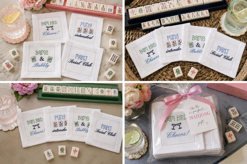 May include: A set of four white square fabric coasters featuring embroidered Mahjong-themed text and graphics including Bam Bird Cheers, Pung intended, Bams & Bubbly, and MahJ Social Club, with some coasters packaged in a clear bag with a pink ribbon.