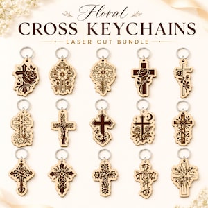 May include: A collection of fifteen laser-cut wooden cross keychains arranged in three rows. Each light-colored wooden cross features unique dark brown engraved floral, vine, or celestial patterns and includes a silver-toned metal keyring.