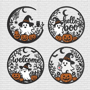 May include: Four circular black wall signs featuring white ghosts wearing orange-buckled hats, orange jack-o'-lanterns, and foliage. One sign says hello boo, another says welcome, and others feature spiderwebs, an owl, a lantern, and a coffee mug.