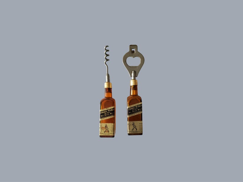May include: Two bar tools: a corkscrew and a bottle opener. Both are designed with brown bottle-shaped handles featuring labels. The corkscrew has a silver spiral, and the bottle opener has a keyhole-shaped top. The background is a solid gray.
