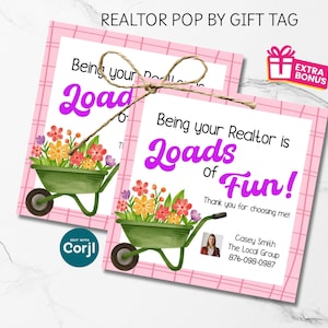 May include: Two pink gift tags with the text "Being your Realtor is Loads of Fun!" and a green wheelbarrow filled with colorful flowers. The tags are tied together with twine and have the text "REALTOR POP BY GIFT TAG".