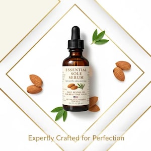 Puede incluir: Una botella de vidrio marr&oacute;n de Essential Sole Serum con un cuentagotas negro, rodeada de almendras y hojas verdes. La etiqueta dice "Daily Revival Oil for Beautiful Soles". Tambi&eacute;n se ve el texto "Veteran & Women Owned".
