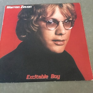 Warren Zevon Excitable Boy on Asylum Records 1978 with I Will Sleep When I Am Dead The Dirty Life And Times Hard Cover By Crystal Zevon