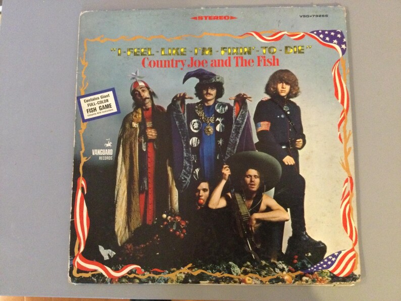 May include: A set of three ceramic mugs with a speckled, matte finish. The mugs are in shades of cream, light gray, and dark gray. Each mug has a simple, minimalist design and a rounded handle.