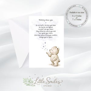 May include: A sympathy card with a white envelope. The card features a watercolour illustration of a teddy bear blowing dandelion seeds. Text reads "Thinking about you" and a comforting message. Available in 15x10 or 18x13 cm.