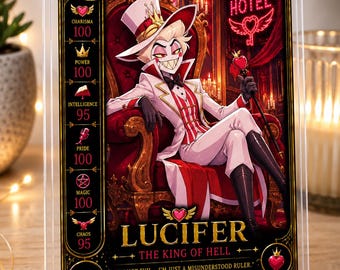 May include: A rectangular collectible fan card featuring an illustration of Lucifer from Hazbin Hotel sitting on a red throne. The card displays stats for charisma, power, intelligence, pride, magic, and chaos, with the text "LUCIFER THE KING OF HELL."