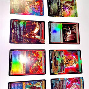 May include: A collection of Magic: The Gathering trading cards, featuring various characters and artwork. The cards display vibrant colors, holographic foil, and text descriptions. The cards are rectangular and have a glossy finish.