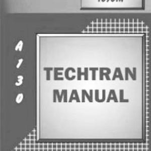 Puede incluir: Imagen en escala de grises de un manual con el texto "TECHTRAN MANUAL" en negrita. La palabra "TOYOTA" está en la parte superior. Los números "A 1 3 0" están en el lado izquierdo del manual.