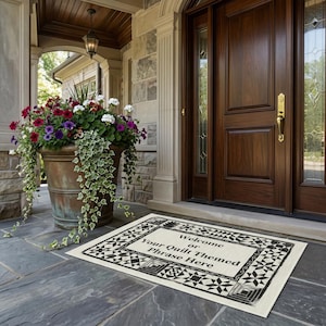 May include: A rustic wooden sign with the text "Welcome to our home" in white lettering. The sign features a distressed finish and a simple, inviting design, perfect for entryway decor.