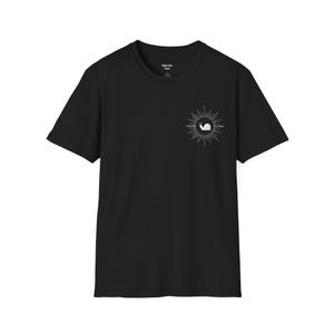 May include: Black t-shirt with a white graphic of a snail inside a sunburst design on the front. The shirt has short sleeves and a crew neck. The brand name "Right Side" is printed on the upper back.
