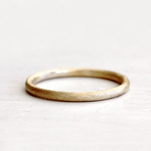 A simple wedding ring. Earthy love. Ford