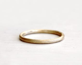 A simple wedding ring. Earthy love. Ford